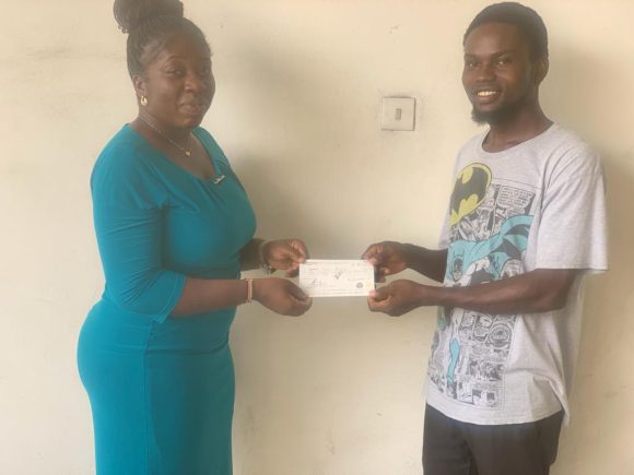 Afasule Foundation extends a helping hand with a N160,000 cheque for a student in need at the University of Port Harcourt.